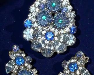 Rhinestone brooch and earring set in sapphire blue and aurora borealis crystals. 