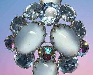 Domed blue moonstone cabochon and blue rhinestone brooch