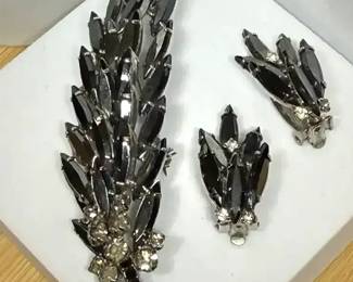 Hematite and black rhinestone leaf brooch and earring set.