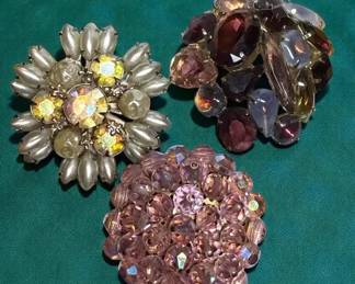 Trio of rhinestone brooches
