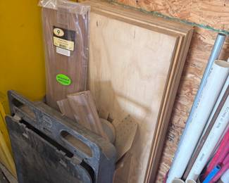 Various pieces of cabinet wood, Laminate, PVC piping, etc.