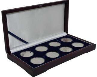 197 - Set of 8 Morgan Silver Dollar in Cases in Box Various Mints: 1880-S, 1881-S, 1882-S, 1883-O, 1884-O, 1885-O, 1887, 1887-CC