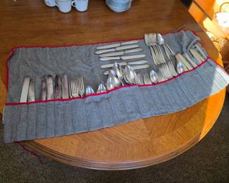 Large silver plate flatware set.