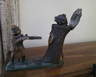 Teddy and the Bear" cast iron mechanical coin bank. Head detaches or is broken? Bank still functioning.