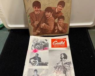 The Beatles school binder. Guild guitar catalog. https://modestlambestatesales.hibid.com/