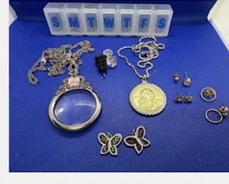 Jewelry. https://modestlambestatesales.hibid.com/