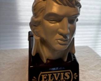 Elvis decanter. https://modestlambestatesales.hibid.com/