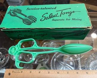 Tupperware tongs. https://modestlambestatesales.hibid.com/