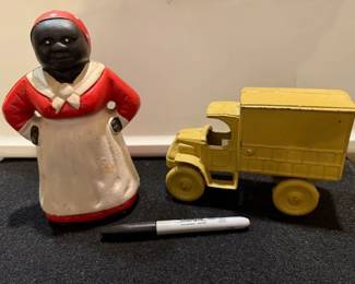 Cast iron black americana coin bank. Military / deliver truck. https://modestlambestatesales.hibid.com/