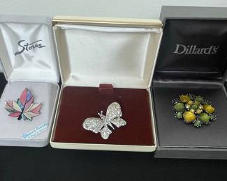 Assorted Vintage Brooches: Maple Leaf, Rhinestone Butterfly, and Cabochon Cluster