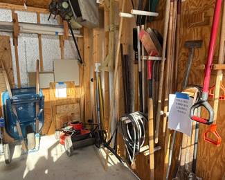Assorted Yard and Garden Tools with Storage Solutions