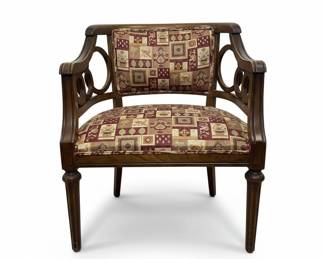 Vintage Mahogany Armchair with Carved Detailing and Geometric Upholstery