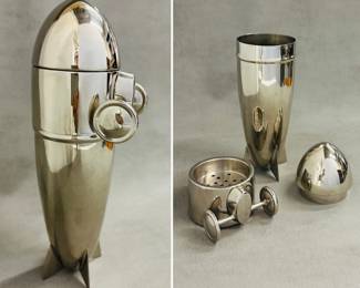 A vintage Art Deco style Zeppelin or "Blimp" cocktail shaker.  It is a three-piece set, consisting of a main vessel, a middle section with a built-in strainer, and a cap. 