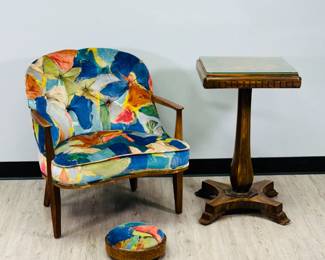 Another view of the Dunbar style chair and foot stool, and a vintage inlaid wooden games table with a fitted glass top