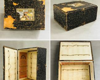 A box for an antique "Laterna Magica" (Magic Lantern), made in Germany.  A magic lantern is an early type of image projector that used painted glass slides and a light source to project images. 
