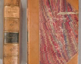 View of a volume from seven volumes by from the Irving's Works series by Washington Irving, published in 1860 through 1867. Hardcovers, half leather and marbled paper, includes titles Astoria, Crayon Miscellany, Bonneville, Mahomet I, Columbus II, Columbus III, and Tales of a Traveler. Publishers G. P. Putnam; Hurd and Houghton. 