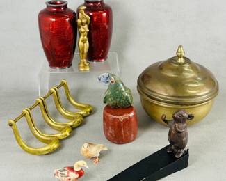 A pair of Japanese Ginbari cloisonné vases with a red "pigeon blood" translucent enamel finish, a vintage Danish cast bronze nude female figural bottle opener, a Carl Auböck (1900-1957) adjustable pipe holder in brass for four pipes, a carved stone figure of a parrot, a lidded brass bowl, and a charming mouse sculpture doorstop likely by Yorkshire artist  Robert "Mouseman" Thompson.