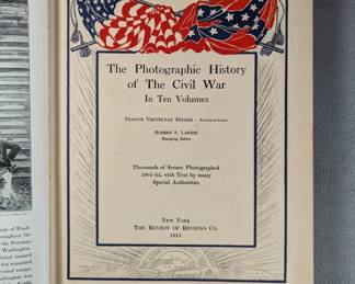 Inside page view of Five volumes of Photographic History of the Civil War by Francis Trevelyan Miller, hardcover, published in 1911 for The Review of Reviews Co., New York. Volumes are The Decisive Battles, Forts and Artillery, The Navies, Solider Life Secret Service, Poetry and Eloquence.