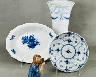 A  Dahl Jensen Bing & Grondahl porcelain girl with a mirror figurine #1351, and three underglaze blue and white porcelain pieces - an oval serving dish, a round dish with waved edge, and a trumpet form vase