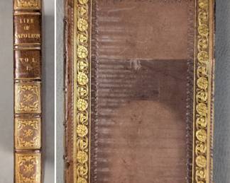 View of Volume I of complete set of nine volumes of The Life of Napoleon by Sir Walter Scott, Second Edition, 1827; leatherbound hardcovers, publisher Longman, Rees, Orme, Brown, & Green, London, and Cadell & Co., Edinburgh.