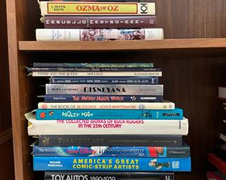 Books including America's Glorious Quilts, Toy Autos 1890-1939, America's Greatest Comic-Strip Artists, Disneyana, Ozma of Oz, and more