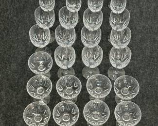Another view of the sparkling set of Stuart Crystal "Kent" pattern stemware – 11 water goblets, 13 champagne coupes, and 12 wine glasses. Made in England.