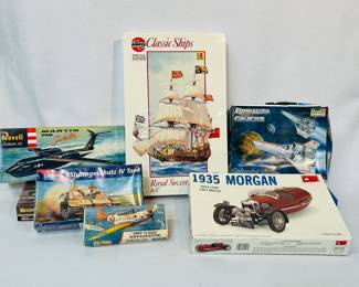 Model kits including a Revell Martin P6M SeaMaster, a Monogram Sturmgeschutz IV Tank, MiniCraft 1935 Morgan Super Sport Three Wheeler model car kit, Revell Battlestar Galactica Colonial Viper, Airfix Classic Ships Royal Sovereign 1637, Airfix 72 scale Devastator