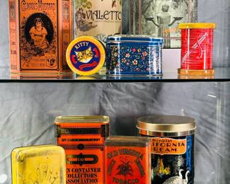 Vintage and replica metal canisters, lidded tins with advertising including Colman's Mustard, Sunkist California Dream, Old Virginia Cut Plug Tobacco, Havanettes, Somers Bros "Five Little Pigs" box, and more.