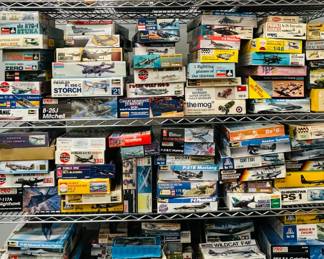 Model mania! Model kits in original boxes, dozens and dozens of model kits, including Ju 87G-1 Stuka, Hawker Typhoon, a box with "3 fighting planes of the thirties," General Dynamics F-111 Tactical Fighter (TFX), P-61A Black Widow, PK-503 Douglas Dauntless, Dornier DO 24T Reconnaissance Seaplane, Lockheed U-2R Spyplane, Pro Modeler PBY-5A Catalina and B-24D Liberator, Heinkel HE 111 Zwilling, Douglas C-47 Skytrain, Junkers JU-52/3m Transport, Revell F-4 Phantom II, B-52G Stratofortress, Fokker D VII, F-18C Hornet and more