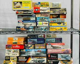 We have racks of model kits in original boxes including Muscongus Bay Lobster Smack all wood display model, Northrup Black Widow P-61B, Monogram Sturmgeschutz IV Tank and Messerschmitt Me-109G, Revell Martin Mariner, Glencoe Models de Havilland Venom FB.4, a P-38J Lightning, Revell F-14D Super Tomcat and Hawker Typhoon, two Matchbox Supermarine Stranraer PK-601, a Glencoe Republic RC.3 Seabee, a Revell B-17E Memphis Belle, and many more