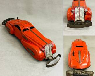 A vintage 1930s Marx red lithographed Streamline "Reversible Coupe" tin wind-up bumper car, also known as the "Marvel Car"