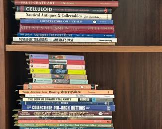 Reference and collector's books including Classic Country Toys, Ray Gun Classics, The Great Antiques Treasure Hint, The Book of Ornamental Knots, Collectible Pin-Back Buttons, Collecting Baby Rattles and Teethers, The Encyclopedia of Antique Postcards, Tobacco Tins: A Collector's Guide, Nautical Antiques & Collectables