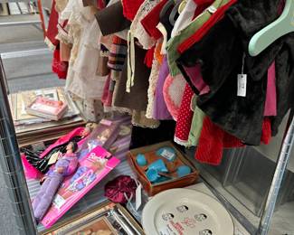 Another view of vintage doll clothes, vintage Barbie dolls, Dionne Quintuplets memorabilia