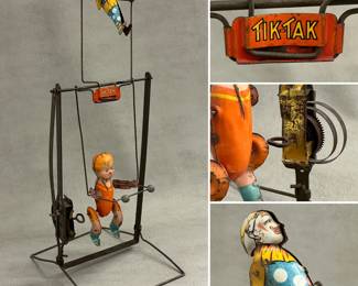A vintage"Tik Tak" tin wind-up toy, depicting circus acrobat and  clown, circa 1930s.
