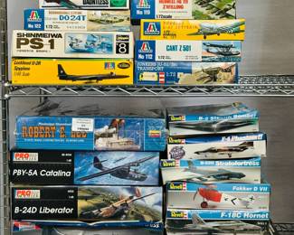 Model kits in original boxes including General Dynamics F-111 Tactical Fighter (TFX), P-61A Black Widow, PK-503 Douglas Dauntless, Dornier DO 24T Reconnaissance Seaplane, Lockheed U-2R Spyplane, Pro Modeler PBY-5A Catalina and B-24D Liberator, Heinkel HE 111 Zwilling, Douglas C-47 Skytrain, Junkers JU-52/3m Transport, Revell F-4 Phantom II, B-52G Stratofortress, Fokker D VII, F-18C Hornet and more