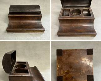 A vintage or antique brass lidded desktop inkwell and stamp holder with a beautiful patina