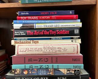 Vintage books including The Boardgame Book, Mechanical Toys, Moby Dick, The Art of the Toy Soldier, Tramp Art, Toy Trains A History, The Golden Age of Toys