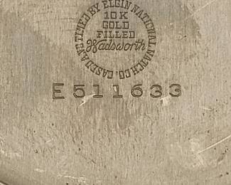 Interior of the case on the Elgin Deluxe pocket watch, 1942, 17 jewels, runs, keeps time