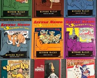 A collection of the classic comic strip "Little Nemo in Slumberland" by Winsor McCay, includes Volumes 1 through 6;  R.F. Outcault's the Yellow Kid: A Centennial Celebration of the Kid Who Started the Comics, The World of Puppets by René Simmen, and  a vintage hardcover book titled Cracker Jack Prizes by Alex Jaramillo