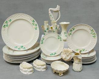 Vintage Belleek including 2 vintage Belleek boat-shaped open salt cellars, 1&nbsp;Belleek Ireland porcelain Neptune shell-footed sugar bowl or dish, 1 Belleek Irish porcelain Neptune vase/planter with applied roses and shamrocks, 1 Belleek Undine creamer, 2&nbsp;&nbsp;Belleek Shamrock tree trunk vases, 1&nbsp;vintage Belleek Pottery (Ireland)&nbsp; shamrock harp figurine, 1 Belleek Pottery Daisy spill vase