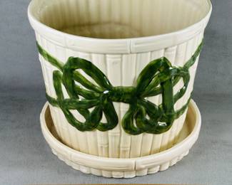 Cream-glazed ceramic faux bamboo planter pot with matching tray, the pot decorated with a raised green glazed bow