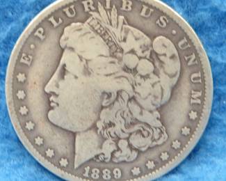Lot 255. 1889 O Morgan Silver Dollar