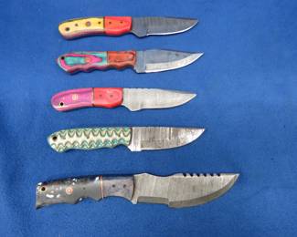 Lot 284. Five new Damascus knives with leather sheaths and no markings