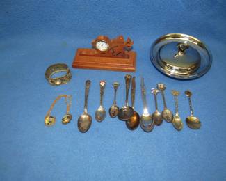 Lot 162. Misc. collectibles including souvenir spoons, wooden desk clock, bracelet, and more