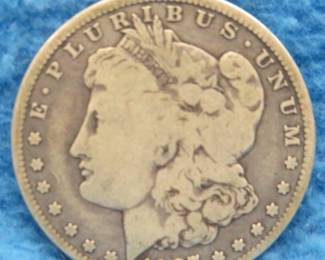 Lot 212. 1887 O Morgan Silver Dollar