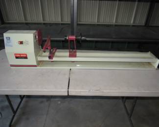 Lot 390. Tool Shop wood lathe Model XXX 36" travel.