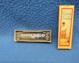 Lot 260. Young Scamp diatonic harmonica in the box. Sounds great. Made in Russia-occupied East Germany.