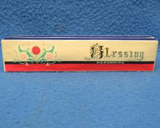 Lot 81. Blessing 24-hole tremolo harmonica made in China in excellent condition. Sounds great.