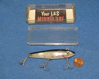 Lot 192. L & S MirrOlure 2M21 bait in the box with papers