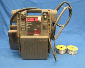 Lot 393. Solar rechargeable wire feed welder. Model 2135. Includes wire. Needs charging cord. Untested.